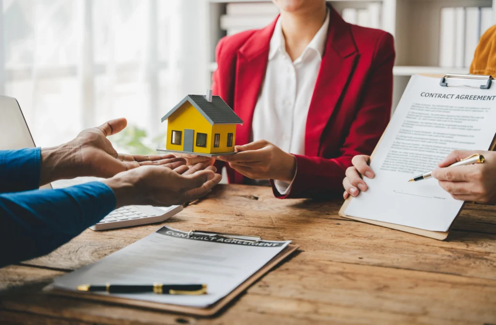 property agent explaining Dubai Mortgages to a client